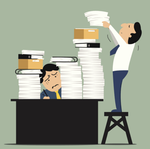 stack of papers on desk.png